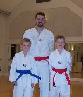 Lewis, Des and Connor after receiving their new belts